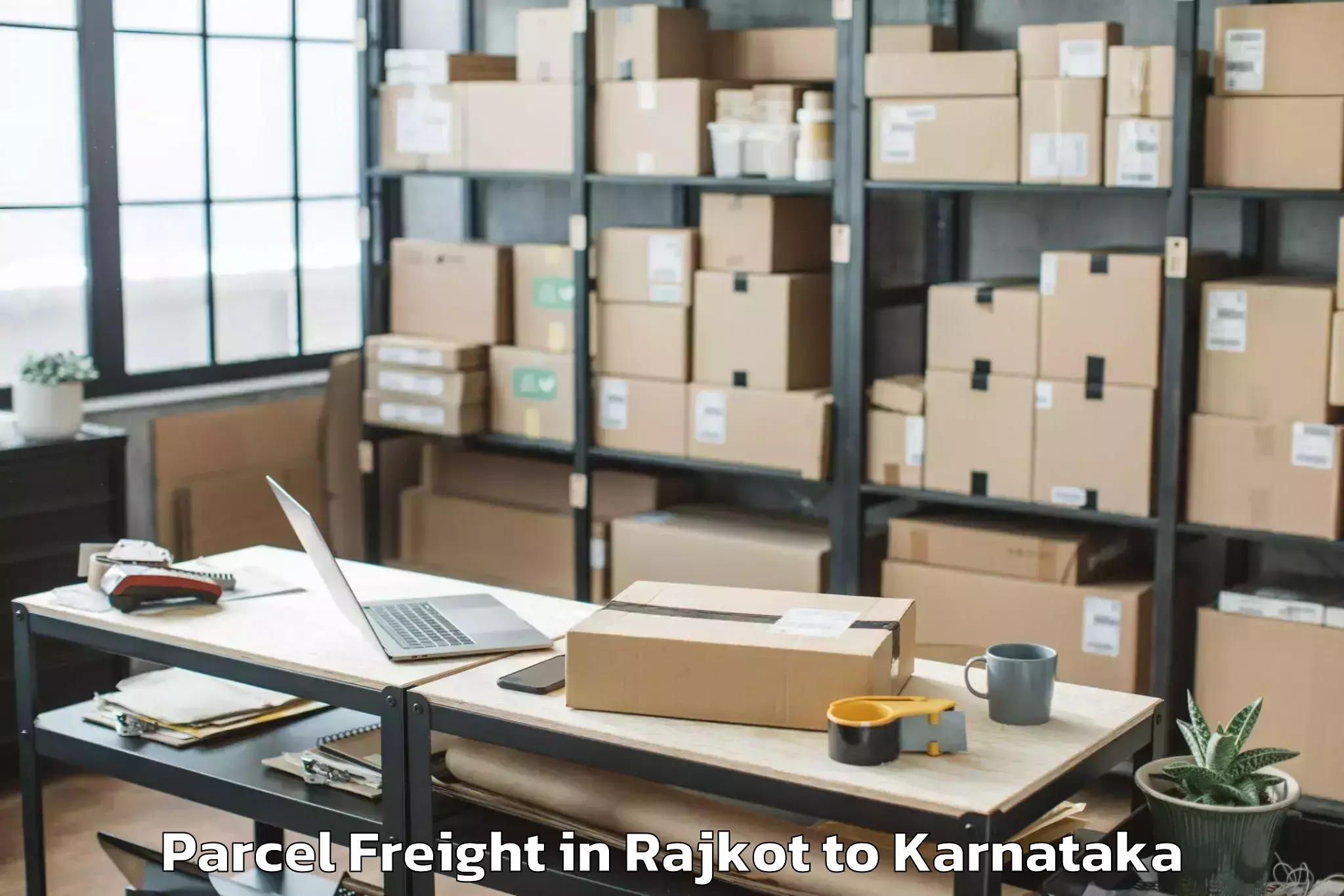 Leading Rajkot to Humnabad Parcel Freight Provider